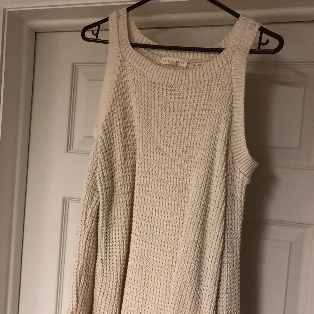 Long sleeve sweater with cut out shoulders